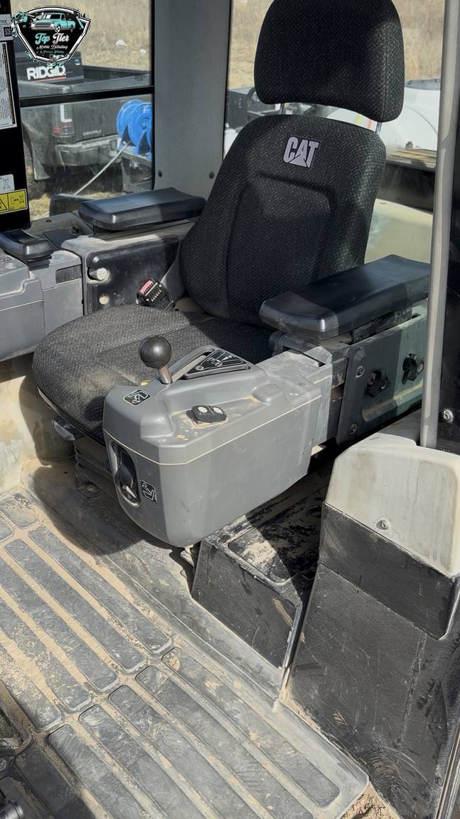 A cleaned operator cab on a piece of heavy equipment